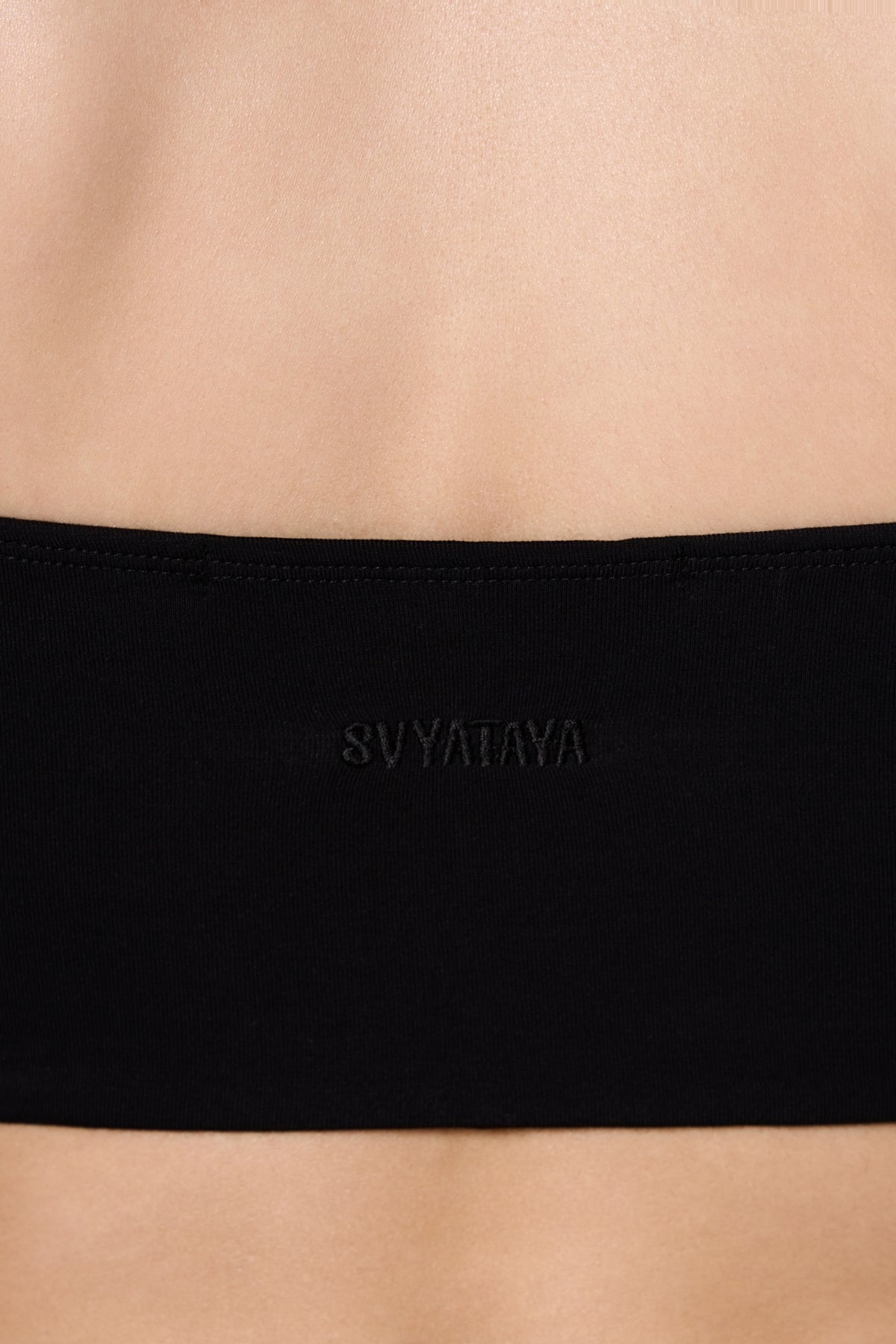 Top bandeau con mangas largas